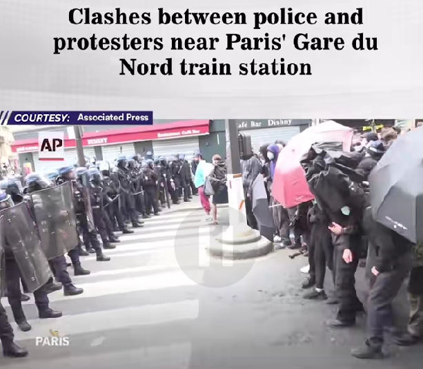 Paris in Chaos: Massive Clashes Erupt Near Gare du Nord — Police Line vs. Protesters With Umbrellas