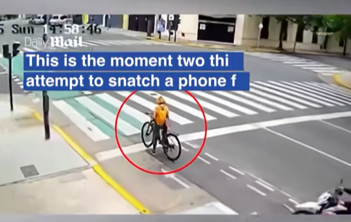 “CCTV Captures Shocking Moment: Bike-Riding Thieves Target Pedestrian — But Karma Hits Back Instantly”